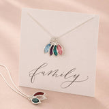 Silver marquise birthstone charm necklace on a Family keepsake card, colourful personalised jewellery.