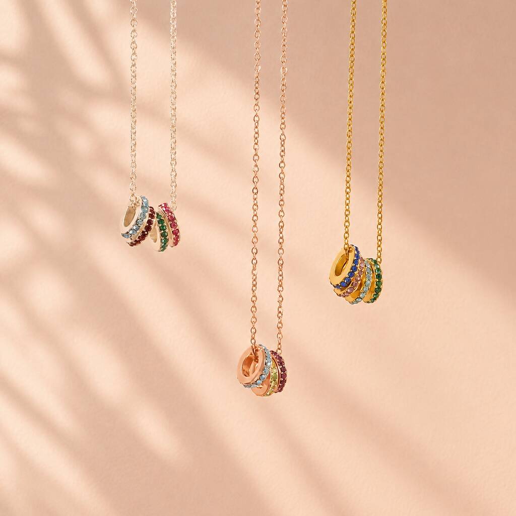 Birthstone rings necklaces in silver, rose gold and gold, colourful jewellery for layering and styling