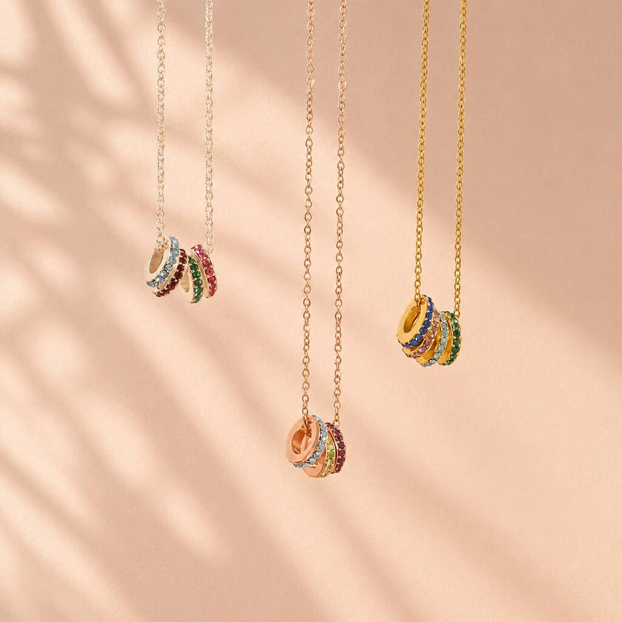 Birthstone rings necklaces in silver, rose gold and gold, colourful jewellery for layering and styling