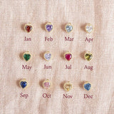 Image shows Crystal Birthstone Hearts Chart, from top left; Garnet January, Amethyst February, Aquamarine March, Crystal April, Emerald May, Light Amethyst June, Ruby July, Peridot August, Sapphire September, Rose October, Yellow Topaz November, Blue Zircon December.