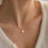 Gold plated four leaf clover necklace with a polished charm, timeless layering jewellery for everyday style.