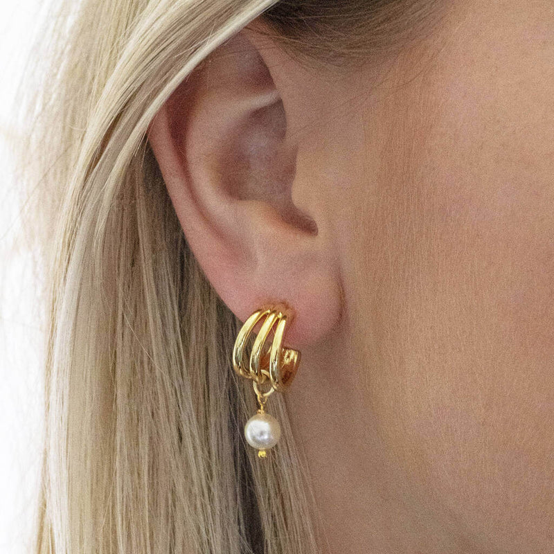 Model wears Gold Plated Triple Hoop Pearl Earrings