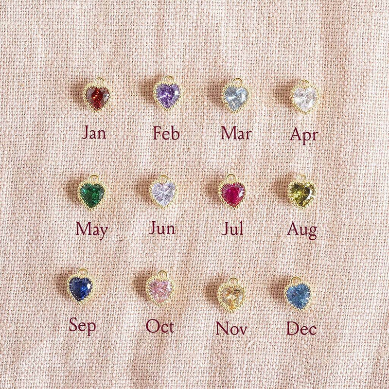 Image shows heart birthstone options from left to right: January, February, March, April, May, June, July, August, September, October, November, December.