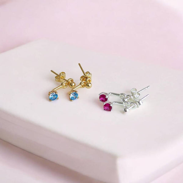 Mixed metal birthstone stud earrings with colourful crystal accents, perfect for creating a personalised ear stack