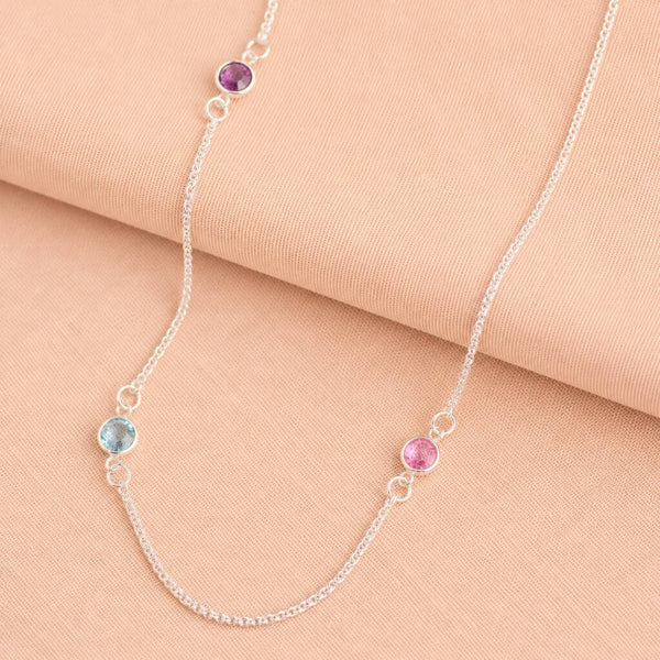 Silver long birthstone necklace with colourful crystal accents, delicate personalised jewellery for effortless layering.