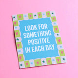 Motivational wall art print featuring Look For Something Positive quote on blue background