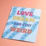 Love Dream Stay Weird colourful A5 art print with bold positive lettering