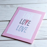 Romantic A5 wall art print with pastel pink border and Love typography