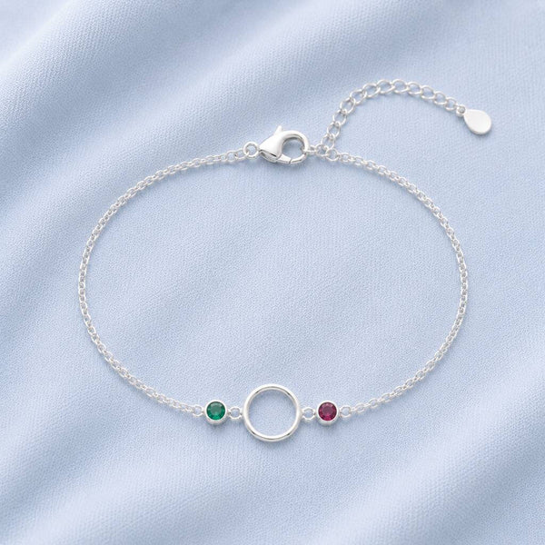 Silver plated circle bracelet featuring two bezel set birthstones for colourful everyday jewellery styling