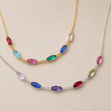 Silver and gold plated birthstone link necklaces with vibrant crystal details, perfect for colourful layered styling.