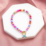 Image shows personalised enamel star colourful stretch bracelet