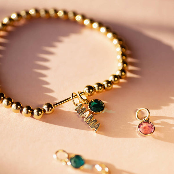 Personalised Mama birthstone bracelet with adjustable beaded design in gold