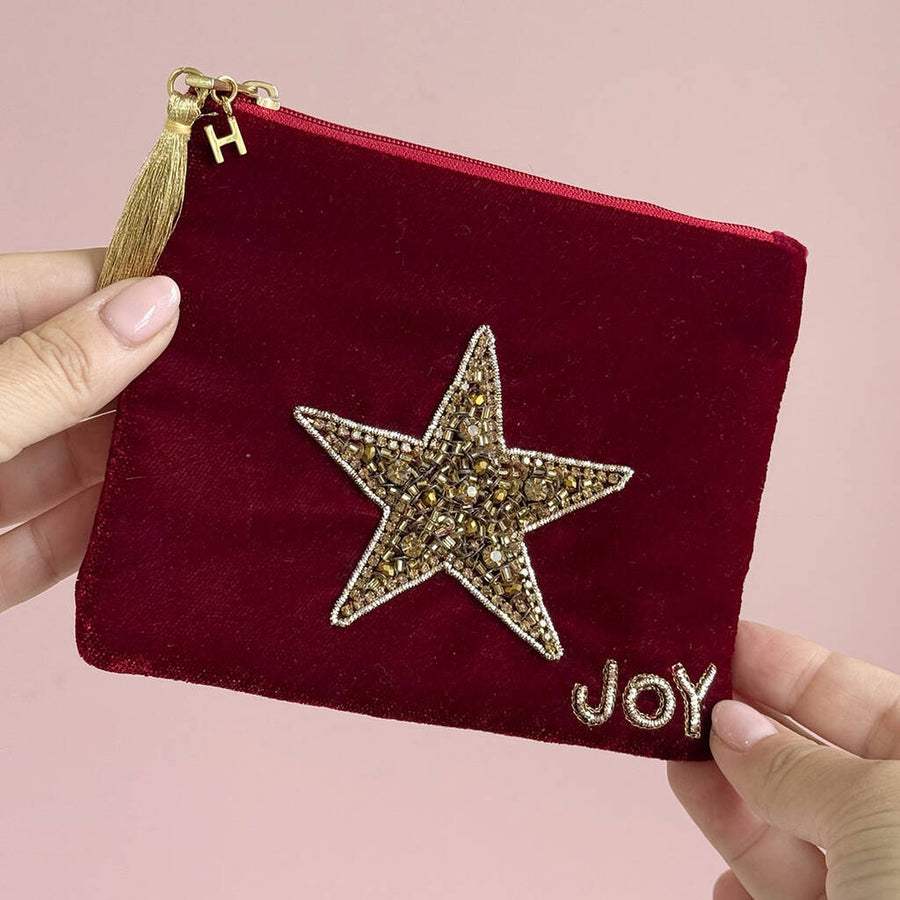 Personalised velvet beaded star pouch with gold initial charm and tassel