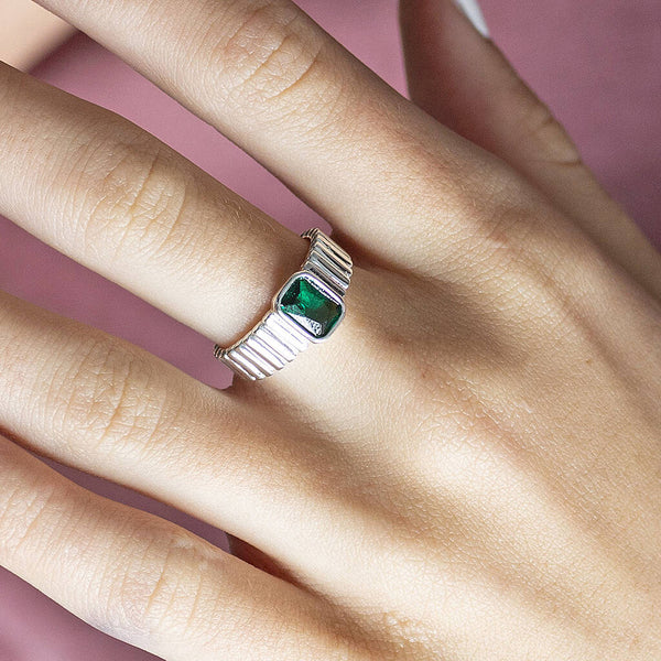 Silver plated ribbed birthstone ring with the Emerald May birthstone.