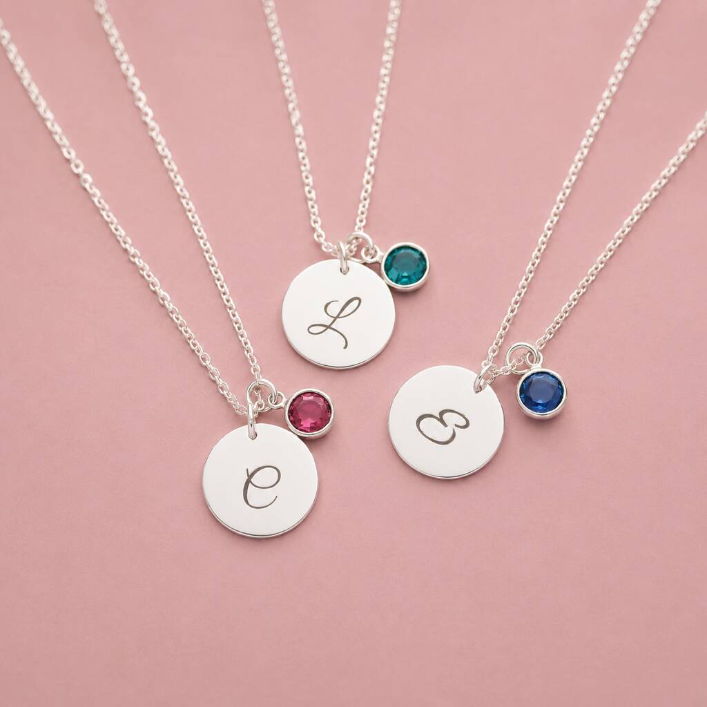 Silver plated initial disc necklaces with colourful birthstone charms, perfect for layering or everyday personalised style