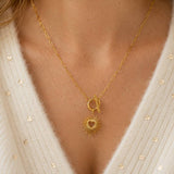 Gold plated sunburst heart T bar necklace with a paperclip chain, elegant layering jewellery for everyday style.