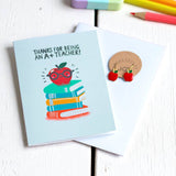 Teacher appreciation card with apple illustration and enamel red apple earrings from Pocketful of Joy