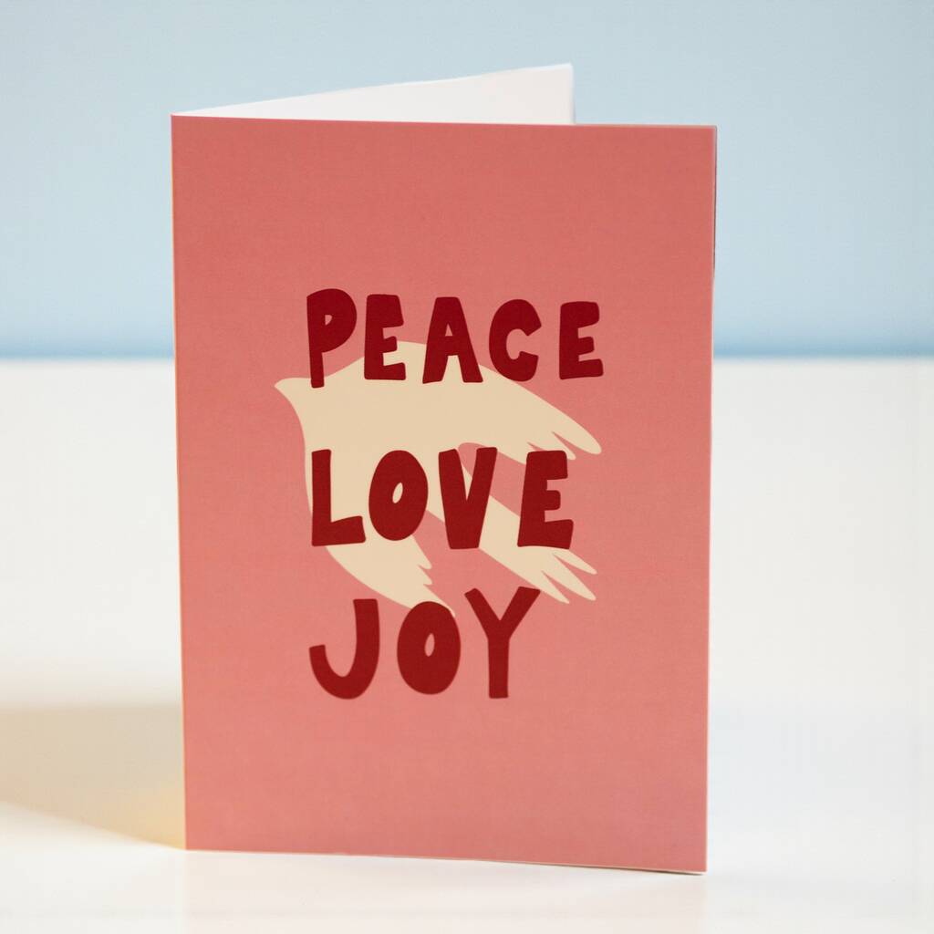 Card with 'Peace Love Joy' text on a light blue background