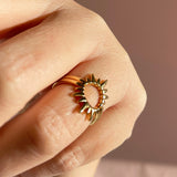 model wears gold plated sol duo ring set worn together on the same finger to represent the sun.