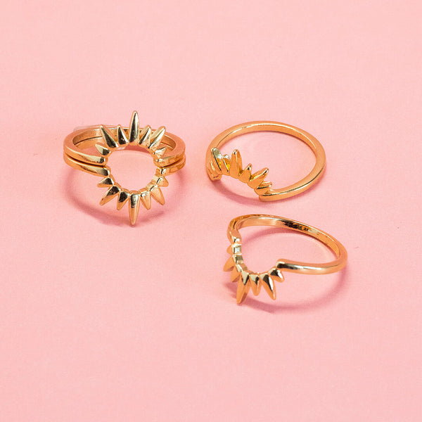 image shows two pairs of rings. Left set worn together to represent the sun, left set worn separately to represent sunrise and sunset. 