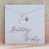 Image shows Sterling silver initial star birthstone bracelet with October Rose Swarovski crystal charm, and sterling silver star charm with a hand stamped initial 'E' presented on a 'Birthday Wishes' sentiment card.